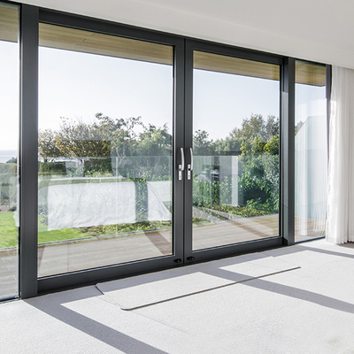 Porte de verre trempé isolée par cadre en aluminium avec la porte Ascenseur-coulissante de preuve d'ouragan