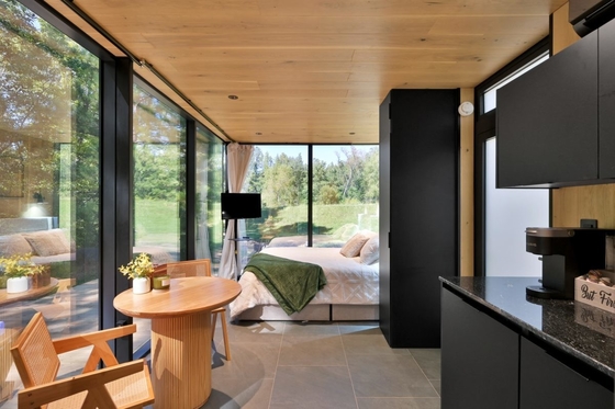 Chambres solaires avec verre transparent et porte double coulissante